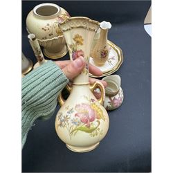 Collection of Royal Worcester Blush Ivory, including candle snuffer modelled as a monk, bamboo vase, twin handled vase etc (12)