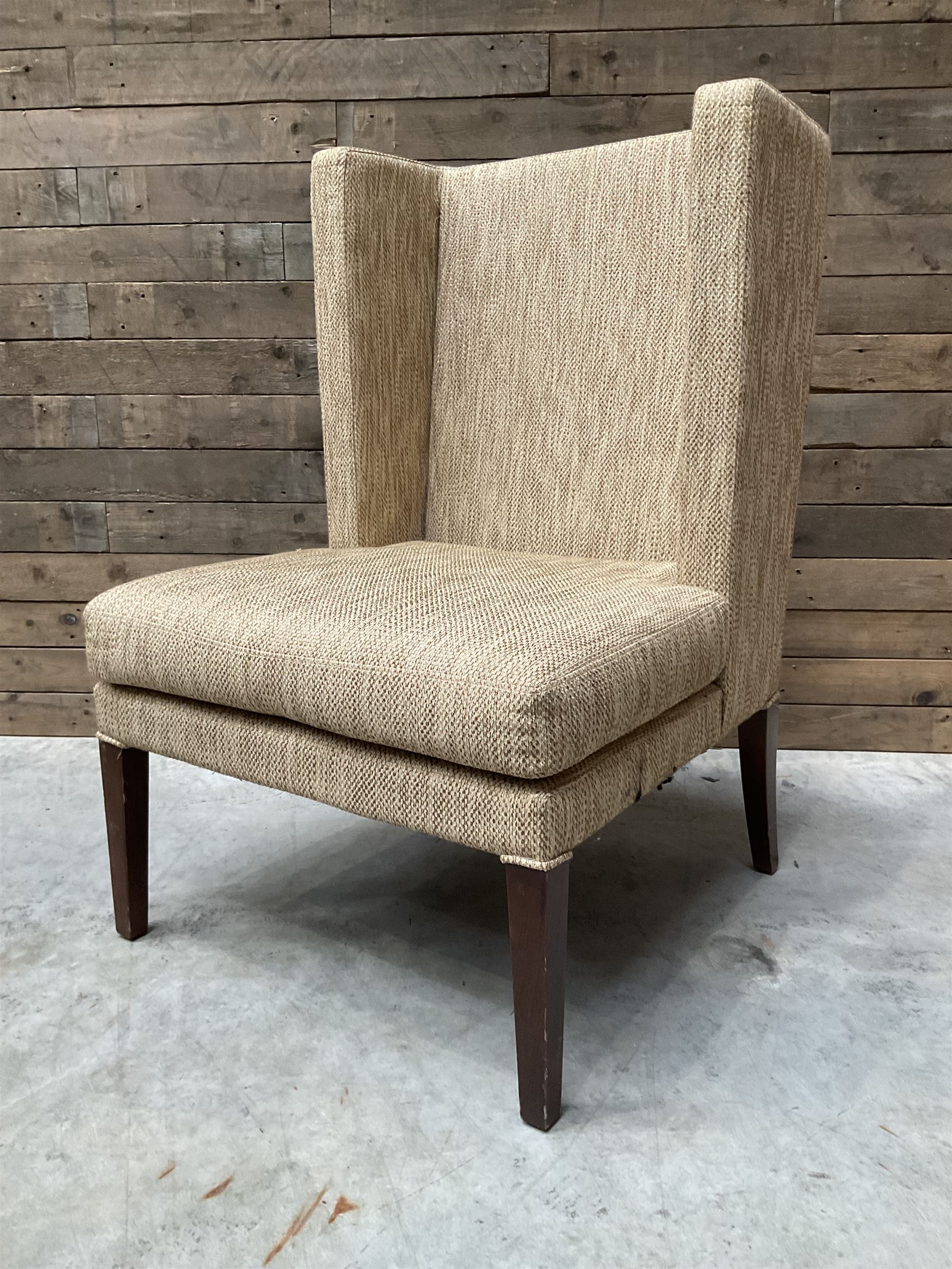 High wing back armchair, upholstered in oatmeal fabric