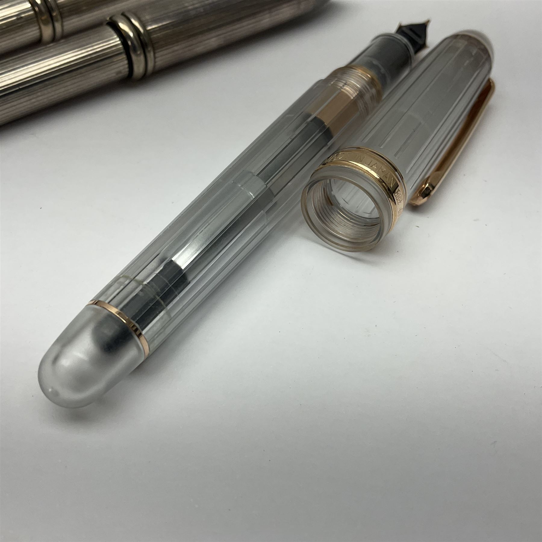 Cross sterling silver fountain pen, having fluted barrel and cap, stamped 