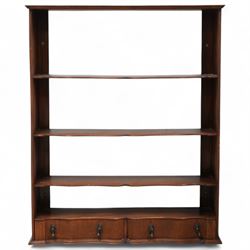 Mahogany wall rack, four serpentine shelves over two drawers with shaped fronts 