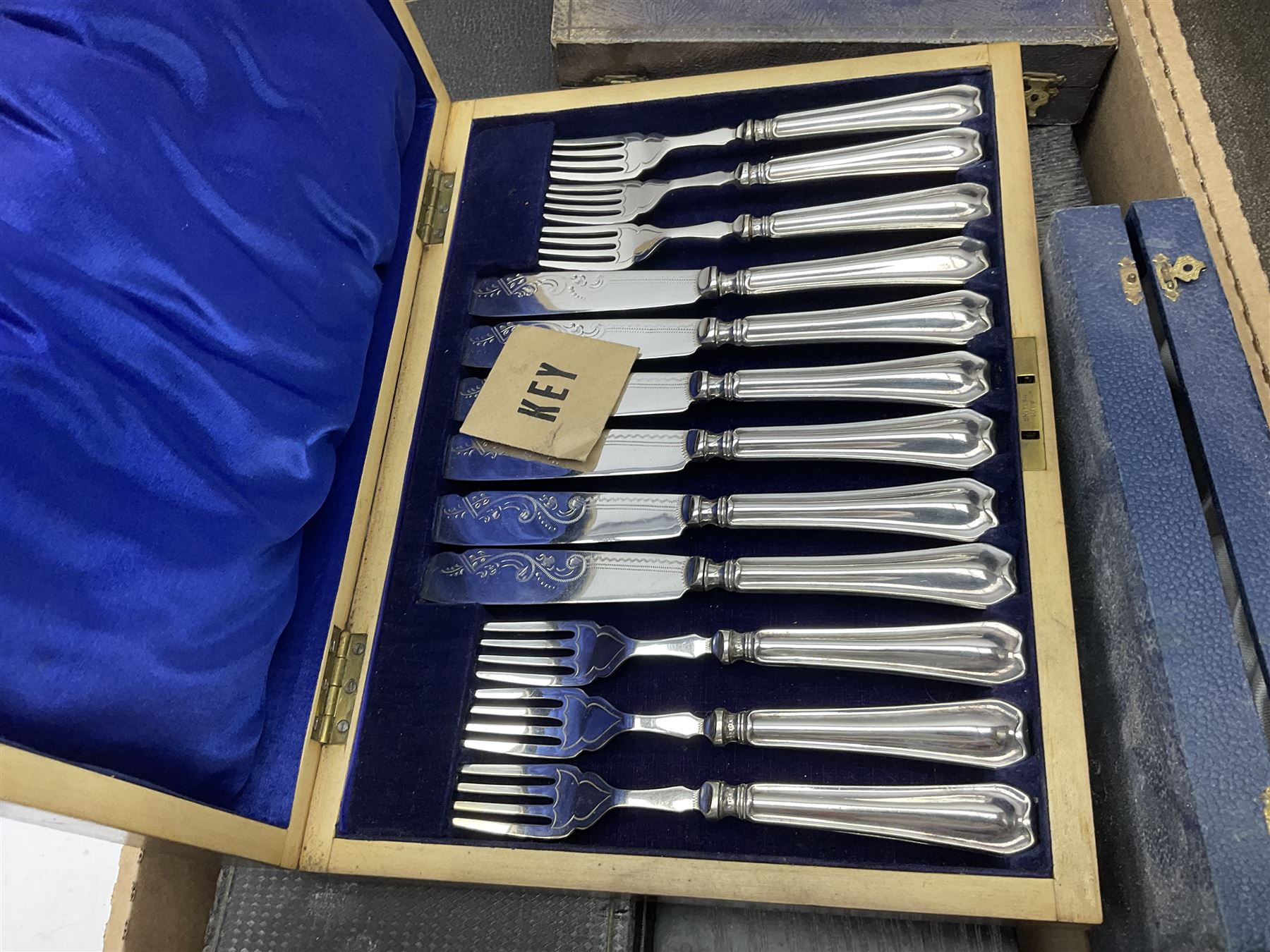 Cased canteens of fish knives and forks, together with part canteen in oak box and various other cased flatware, in two boxes 