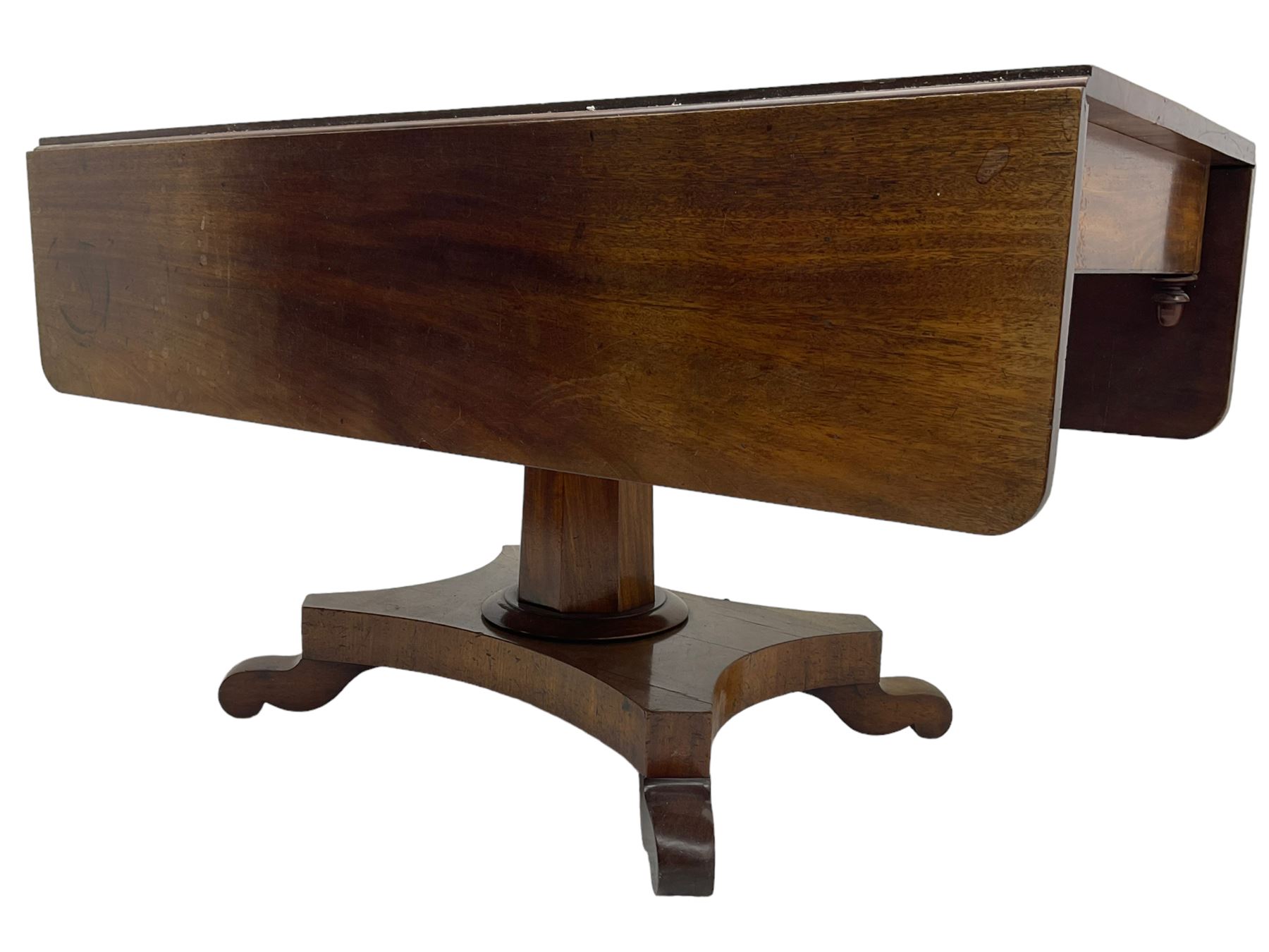 Victorian mahogany supper table, rectangular drop-leaf top with rounded corners, tapered octagonal column on concaved rectangular platform with splayed shaped feet