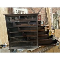 Early 20th stained pine and glazed wall mounting cigarette shop display cabinet, fitted with six sliding drawers with divisions and scalloped handles  - THIS LOT IS TO BE COLLECTED BY APPOINTMENT FROM THE OLD BUFFER DEPOT, MELBOURNE PLACE, SOWERBY, THIRSK, YO7 1QY