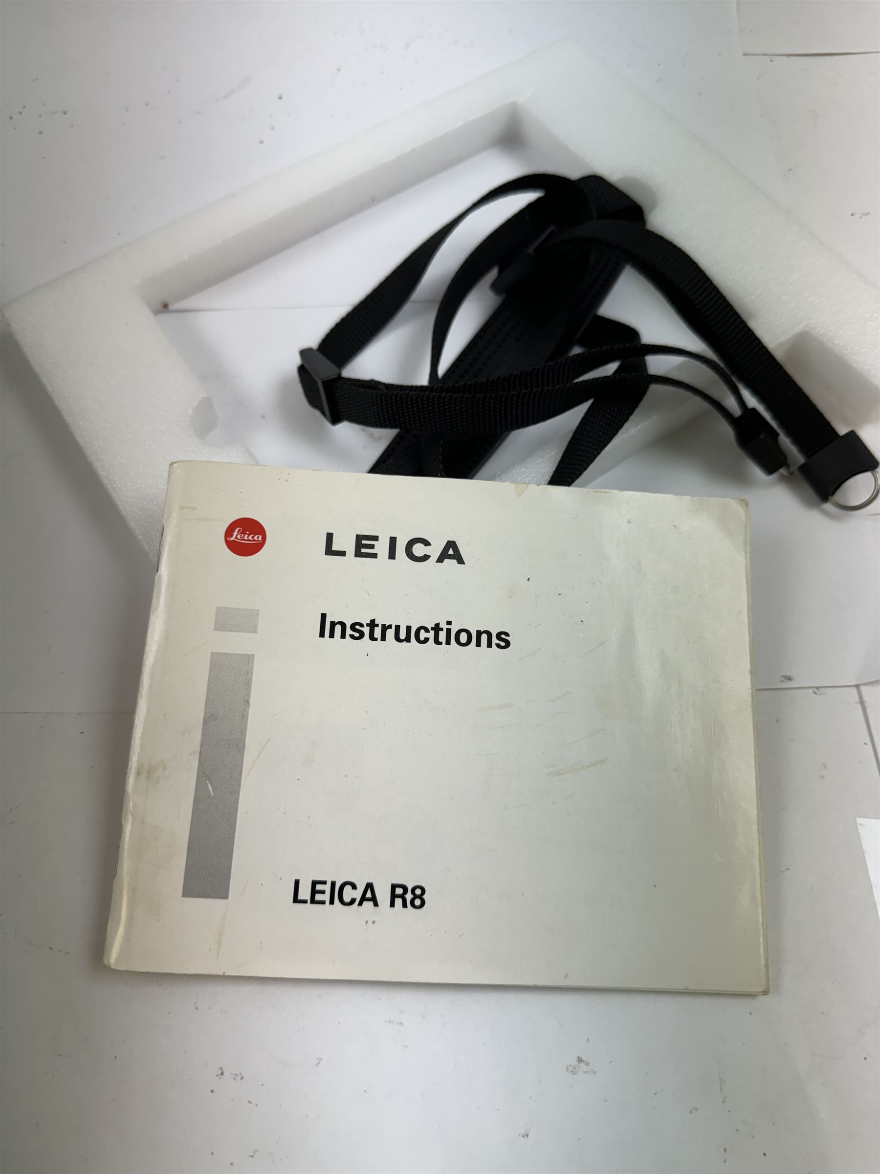 Leica R8 SLR camera body, in chrome and black finish, serial no. 2292640, made in Germany 1996, contained within maker's box with instructions and shoulder strap