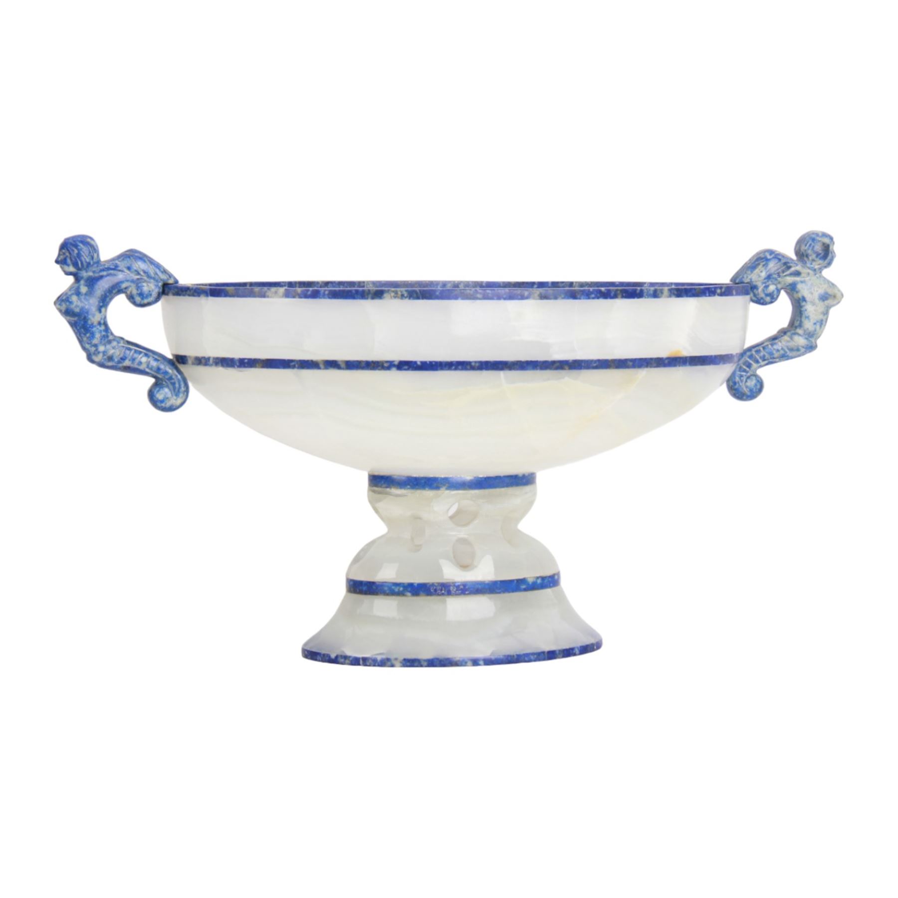 Lapis lazuli and agate twin handled pedestal bowl of navette form, the handles carved as harpies, upon a pierced oval pedestal, 19cm