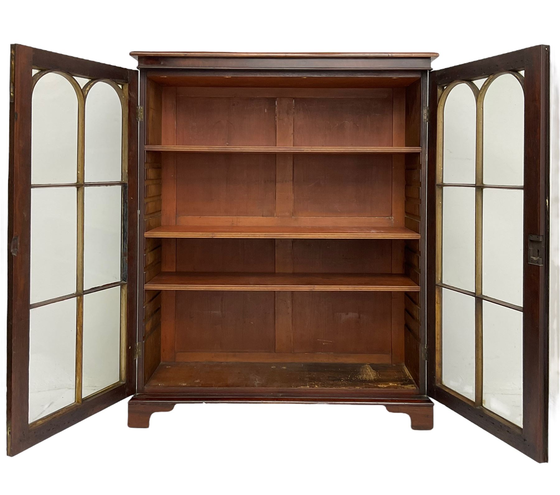 Early 20th century mahogany bookcase, fitted with two astragal glazed doors enclosing three adjustable shelves