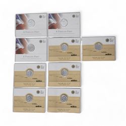 Nine The Royal Mint United Kingdom fine silver twenty pound coins, dated three 2013 'A Timeless First' and six 2014 'Outbreak', all on cards