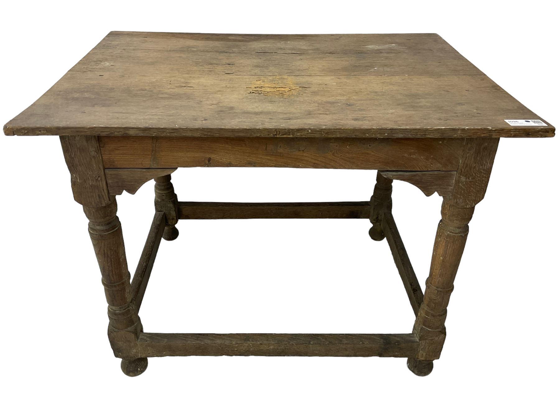 18th century oak joined table, rectangular pegged plank top on turned supports united by plain stretchers