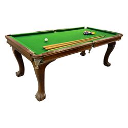 Riley - mahogany slate bed snooker dining table, green baize playing surface fitted with leather net pockets, raised on cabriole supports ending in ball and claw feet; together with set of Riley cues, balls and scoreboard