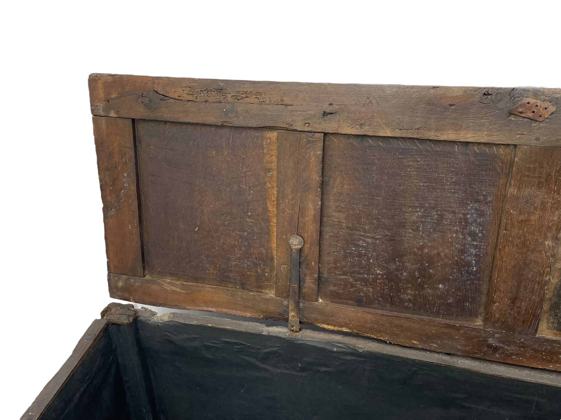 17th century panelled oak blanket chest or kist, quadruple panelled hinged lid over quadruple panelled front, moulded frame and pegged construction, on stile supports