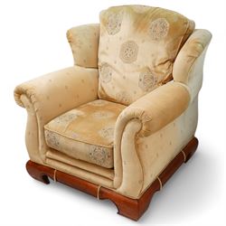 Three-seat sofa (W197cm, D103cm) and pair of matching armchairs (W100cm); upholstered in pale gold fabric decorated with Gul motifs, hardwood framed with polished base