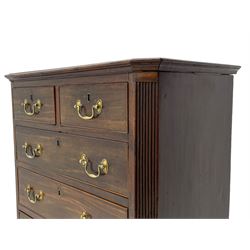 Small George III mahogany chest, rectangular canted form, moulded top over two short and three long cock-beaded drawers, fitted with brass swan neck handles and oval plates, enclosed by fluted upright corners, on bracket feet 