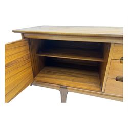 Younger - mid-20th century teak sideboard, rectangular top over three central drawers with recessed handles, flanked by two cupboard doors enclosing two shelves, on tapered supports joined by stretchers