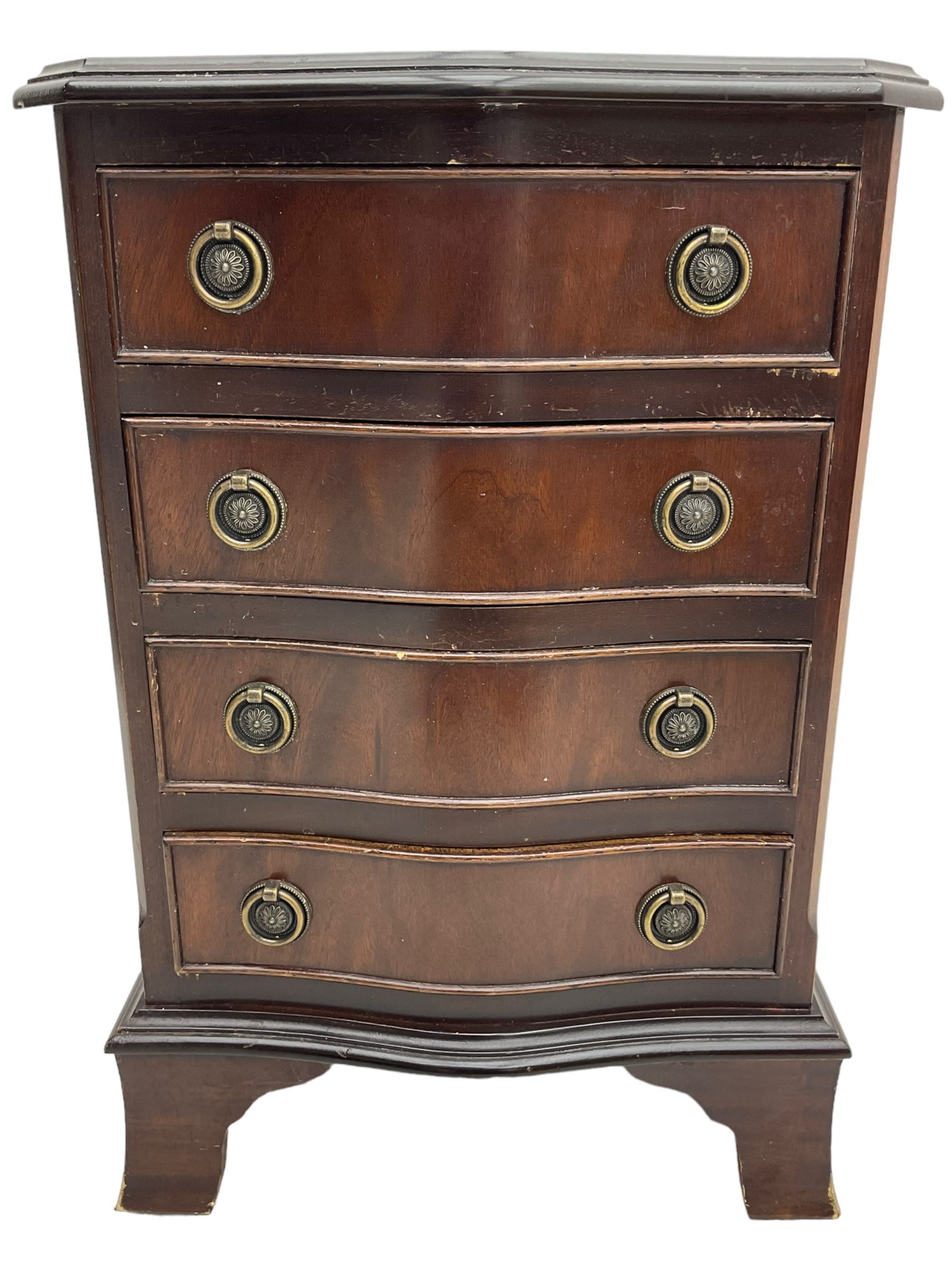 Georgian design mahogany bow front chest of drawers, four cock-beaded drawers with brass ring handles, raised on bracket feet