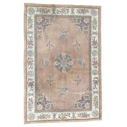 Chinese washed woollen pink ground rug, decorated with floral bouquets and Chinese symbols 