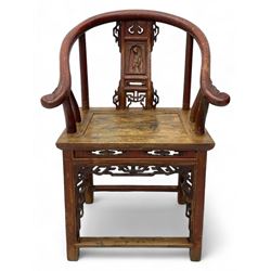 Late 19th century Chinese Qing dynasty horse shoe armchair, in elm, hung mu and Chinese softwood, horse shoe shaped upper rail carved with scroll terminals, shape back carved with solitary figure in robes, rectangular panelled seat in moulded frame, decorated with fretwork panels, on square supports united by stretchers 