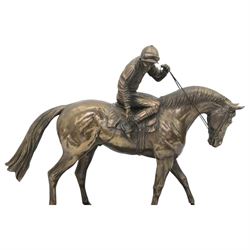 'The Weatherby's Ireland Greenlands Stakes Gr3 Winner - The Curragh 26th May 2012' - bronze resin group by Genesis Fine Art, Ireland with racehorse, jockey and lad on wooden base 34cm x 32cm and another of horse and jockey (2)