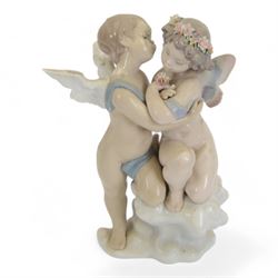 Lladro figure, Heaven and Earth, modelled as two cherubs, no 1824, with original box 