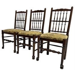 Set of six (4+2) 20th century oak spindle back dining chairs, with upholstered drop-on seat cushions, turned supports joined by turned stretchers