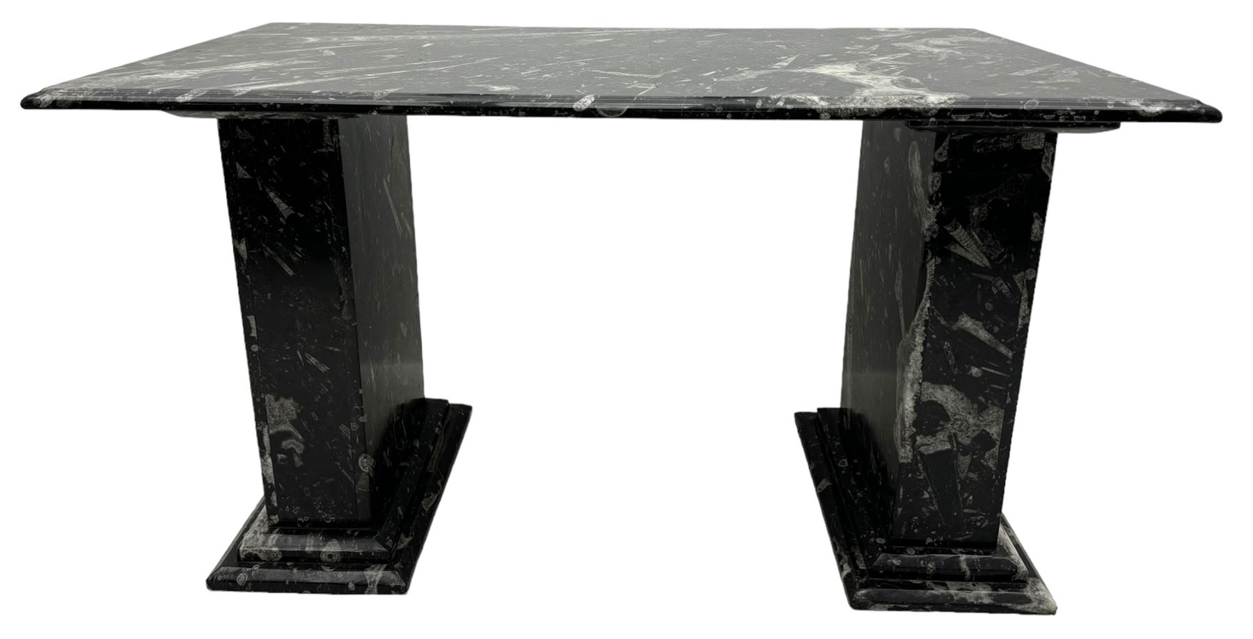 Marble hall table with orthoceras and goniatite inclusions, the rectangular top upon two rectangular stepped plinths, H78cm, L135cm, D77cm