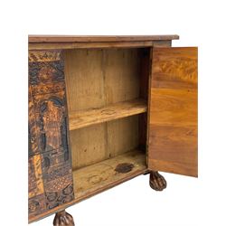 17th century and later cedarwood and pine side cupboard, moulded rectangular top, enclosed by two doors possibly removed and reused from a Venetian Cassone, carved and decorated with penwork, the upper architectural arcade with busts of noblemen, the larger decoration depicting hunters on horseback within woodland landscape with various animals, central and flanking uprights decorated with classical female figures upon pedestals, lower roundels decorated with lion and putto motifs, overall foliate decoration, raised on five hairy paw carved feet, the interior fitted with shelf