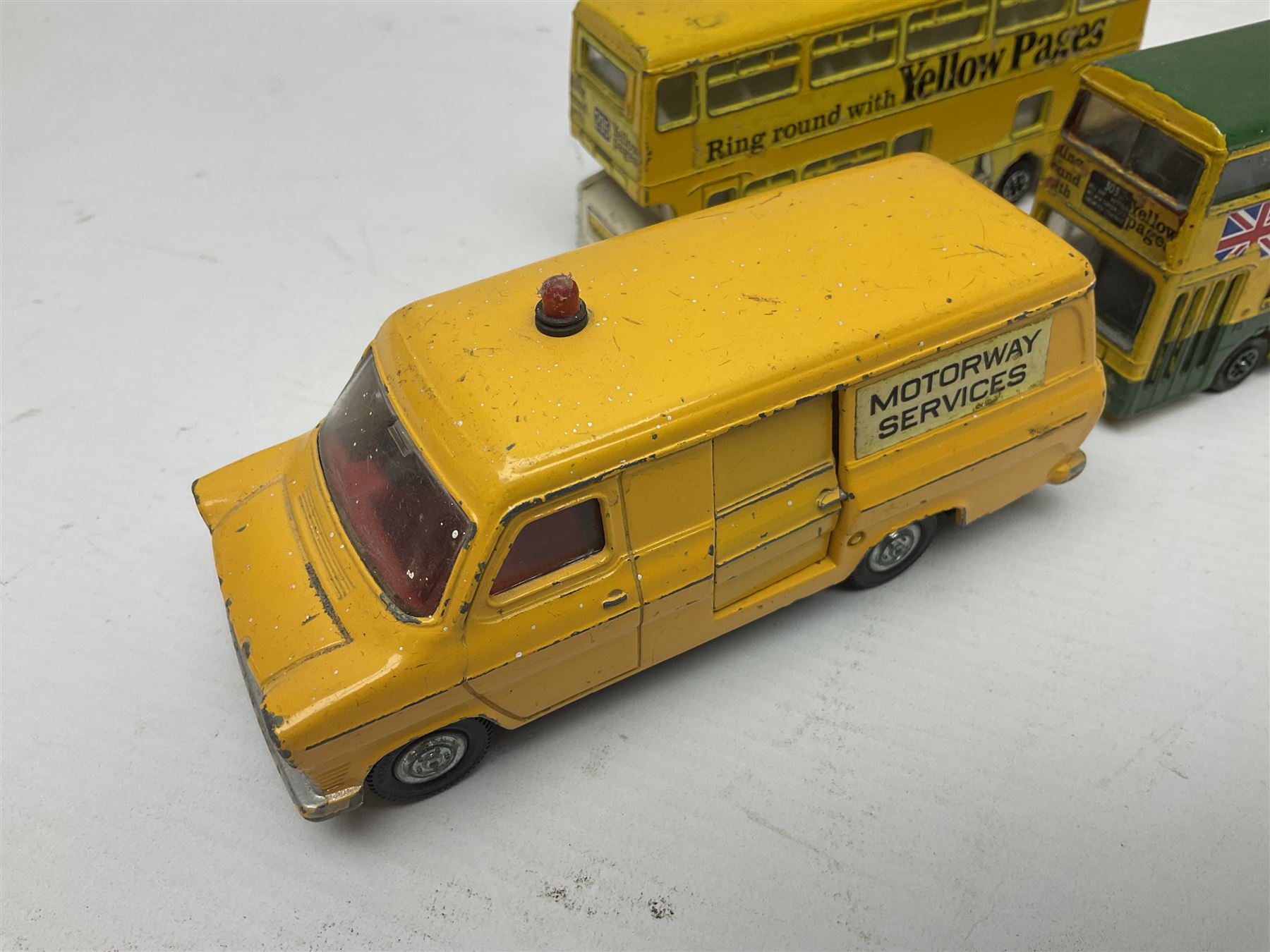 Dinky - sixteen unboxed and playworn die-cast models to include Single Deck Bus, two Atlantean Buses, Ford Transit Van, 10 Ton Army Truck, MGB Sports Car, Telephone Service Van etc 