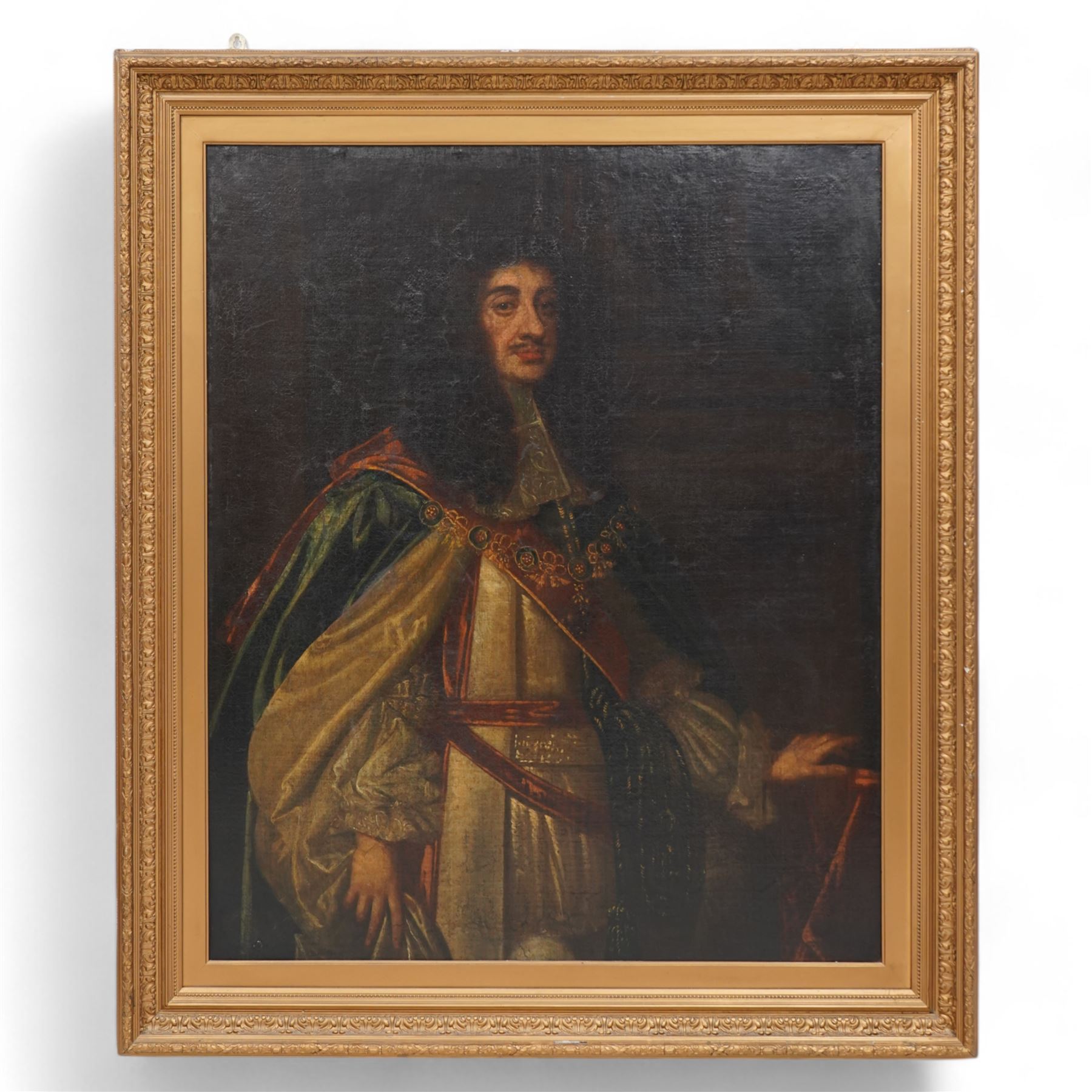 Circle of Sir Peter Lely (Dutch 1618-1680): Three-Quarter Length Portrait of King Charles II Wearing Garter Robes, 17th century oil on canvas laid onto board unsigned 121cm x 98cm, held within ornate gilt frame overall 148cm x 125cm