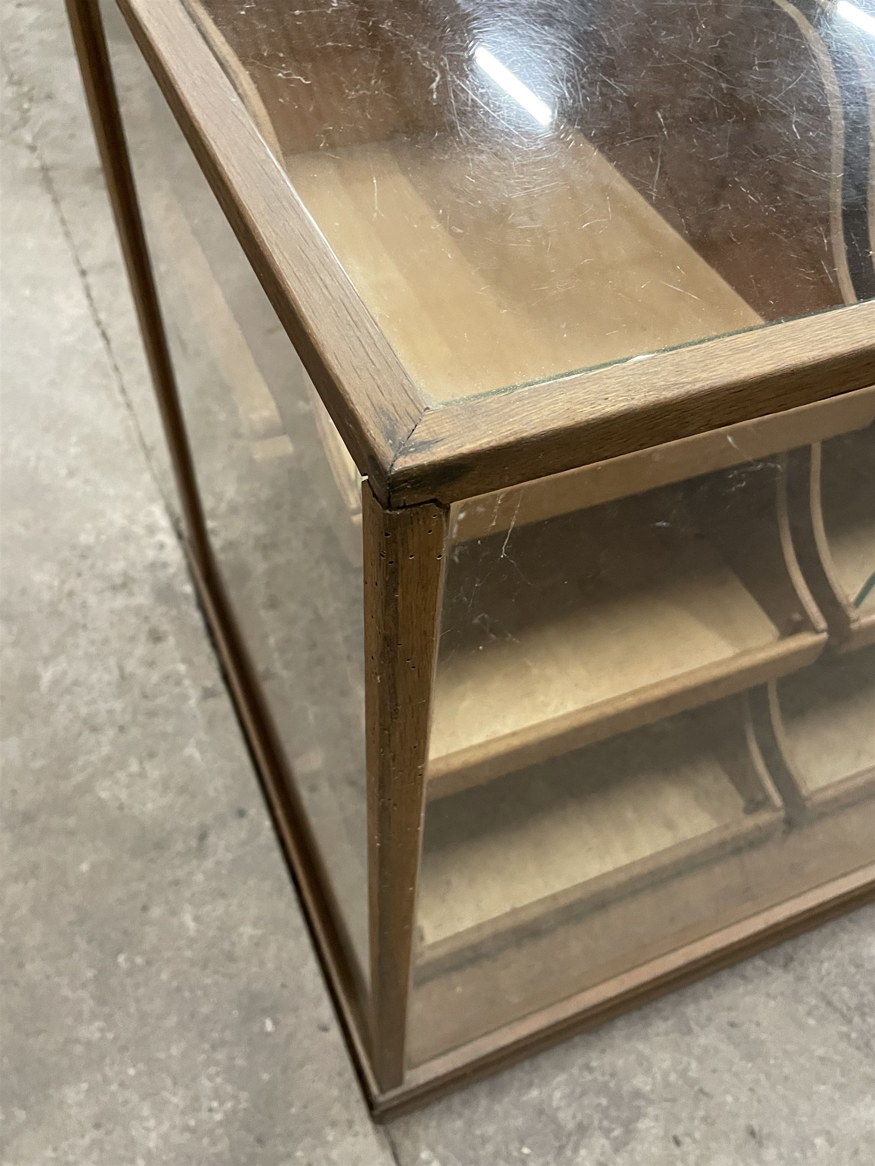 20th century oak and glazed haberdashery shop's display cabinet, fitted with twelve slides, on skirted base - THIS LOT IS TO BE COLLECTED BY APPOINTMENT FROM THE OLD BUFFER DEPOT, MELBOURNE PLACE, SOWERBY, THIRSK, YO7 1QY