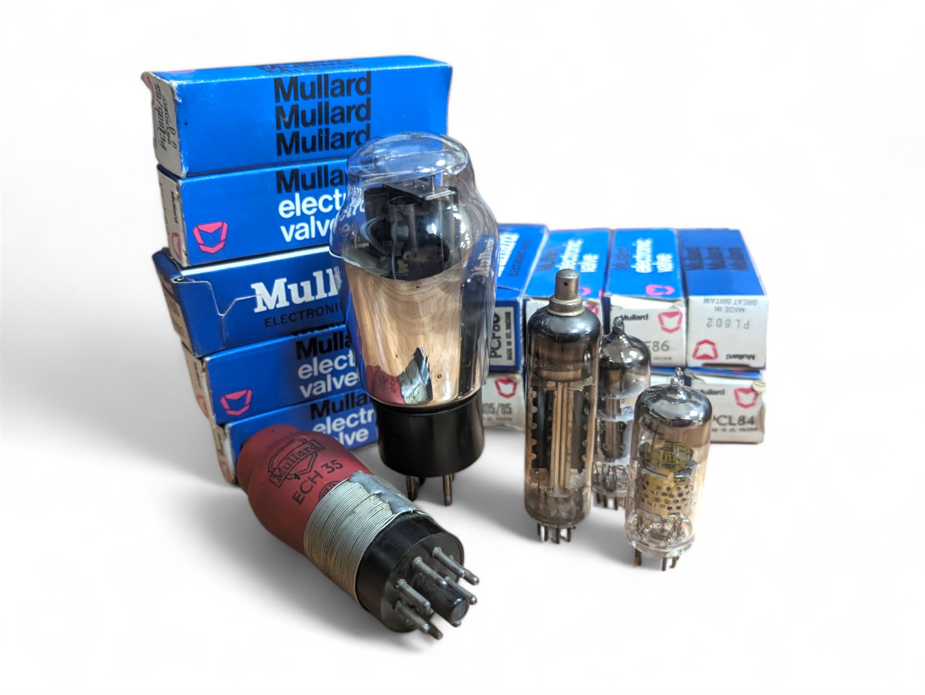 Large collection of Mullard thermionic radio valves/vacuum tubes, including boxed examples and bubble wrapped examples identified with lists