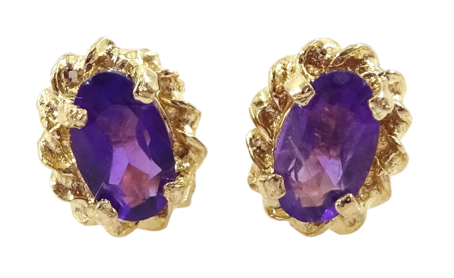 Pair of 9ct gold amethyst stud earrings