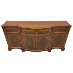 Wade - Georgian design yew wood bow-fronted sideboard, projecting moulded top over four cockbeaded frieze drawers, the central two with pull-out slides, four cupboards below with figured veneers, raised on bracket feet