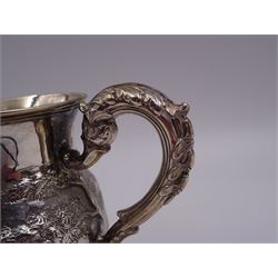 William IV silver christening mug, of waisted form, the body embossed with game birds in a countryside setting and a blank circular cartouche, with acanthus leaf capped scroll handle, upon a circular stepped foot, hallmarked Edward, Edward junior, John & William Barnard, London 1831, H10.2cm