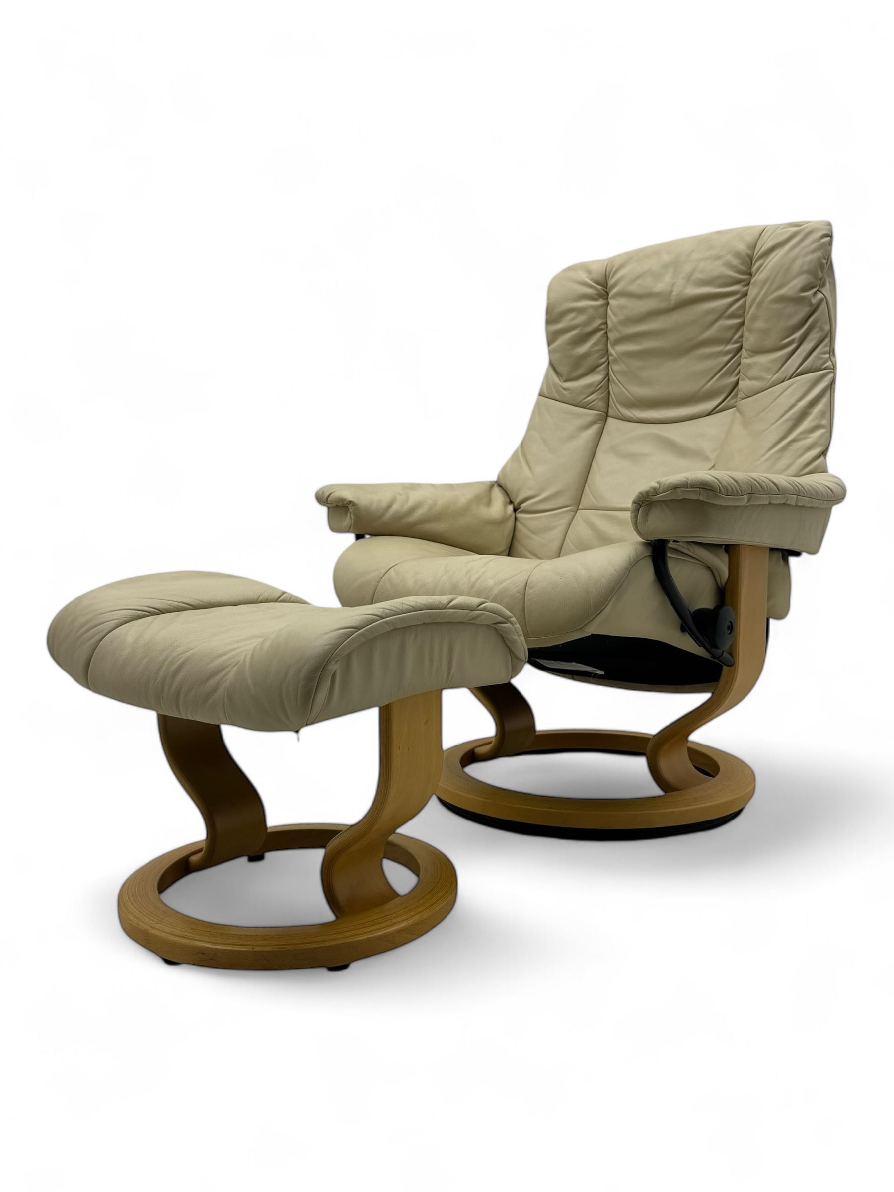 Ekornes Stressless - swivel armchair upholstered in cream leather (W81cm, H103cm); together with matching stool (W49cm)