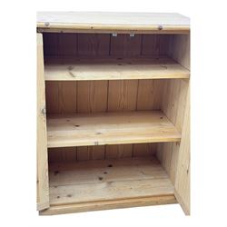 Pine cupboard, rectangular moulded top over two panelled doors enclosing two plank shelves, on plinth base