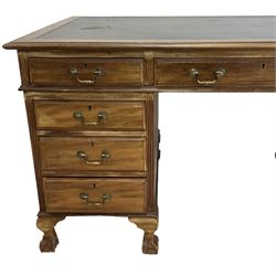 Georgian design twin pedestal desk, rectangular top with green leather inset, fitted with nine drawers, on cabriole supports with ball and claw feet 