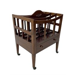 George III mahogany Canterbury, four divisions, fitted with single drawer with turned handles, on square tapering supports with brass cups and castors 