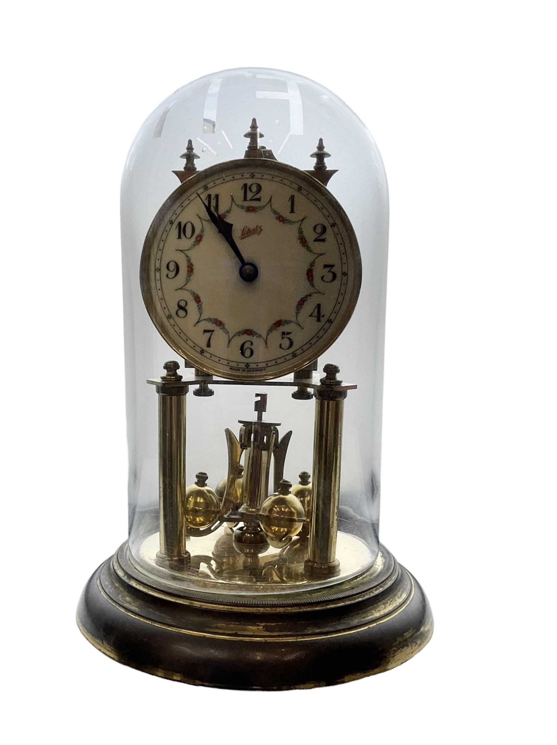 Victorian slate marble clock and a Schatz anniversary clock