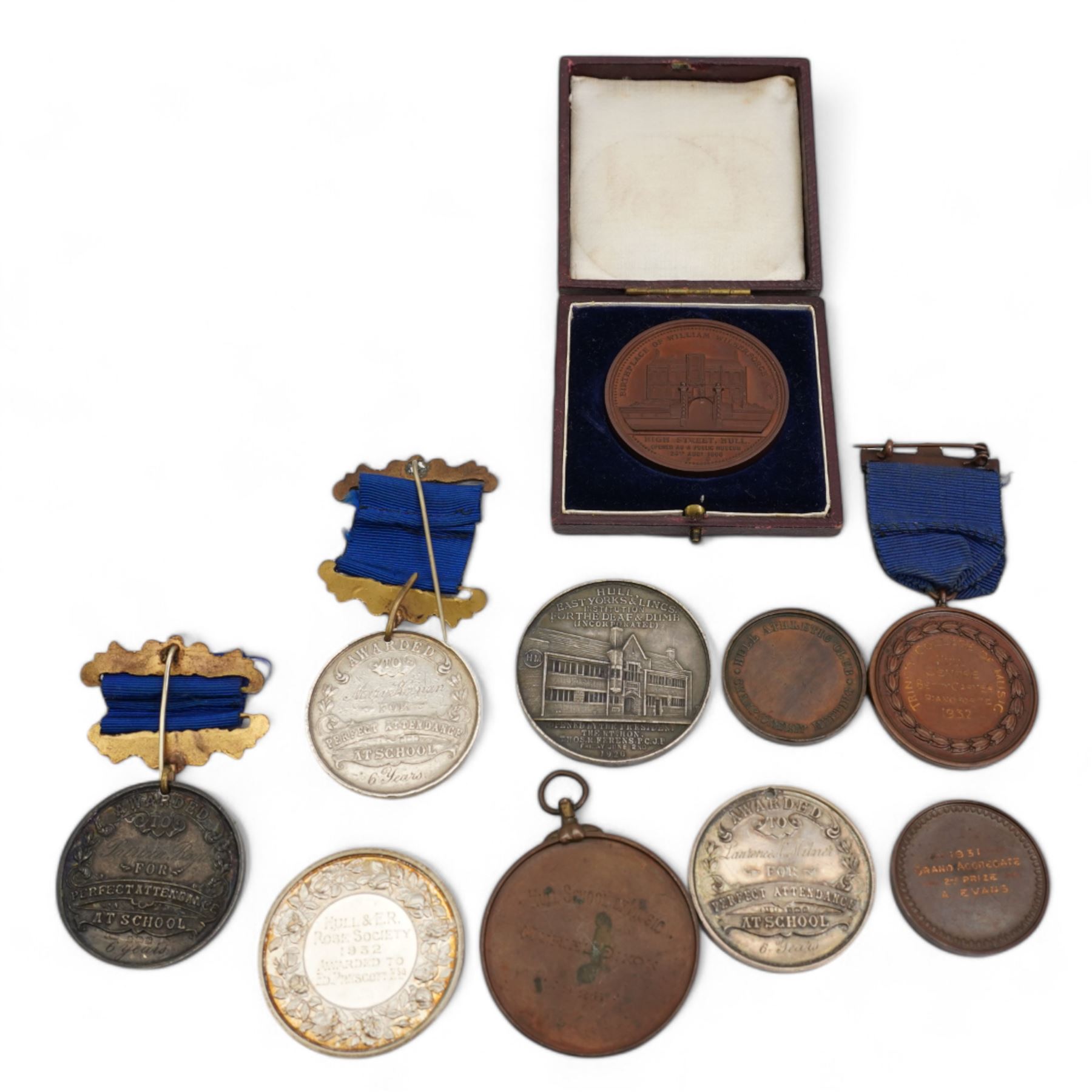 Medallions including three Hull Education Committee hallmarked silver attendance awards, 'Birthplace of William Wilberforce M.P. High Street, Hull' commemorative medallion in fitted case, 'Andrew Marvell Tercentenary 1621-1678 Educated At The Old Hull Grammar School' commemorative medallion in red card case, The Hull Rifle Club '1931 Grand Aggregate 2nd Prize A. Evans' medallion etc