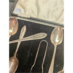 Cased set of six silver coffee spoons and a pair of sugar tongs, hallmarked 