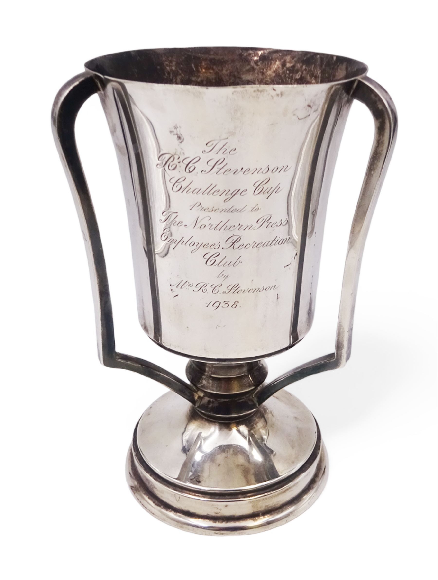 1930s silver three handled trophy, the tapering body inscribed with presentation engraving, upon stepped circular foot, hallmarked Grant & Son, Birmingham 1935, H22cm