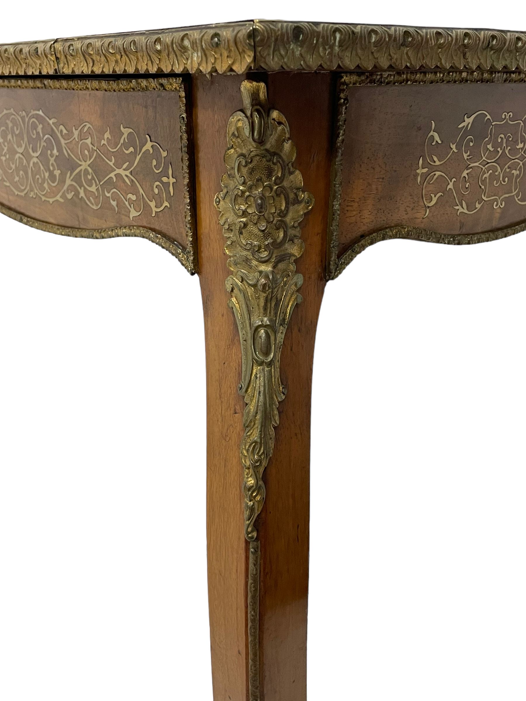 In the manner of Émile Gallé - late 19th to early 20th century inlaid walnut side table, rectangular top inlaid with Japonisme decoration depicting birds within trees, figured crossbanding and cast gilt foliate applied edge, single frieze drawer inlaid with scrolling brass work, on cabriole supports with ornate floral mounts