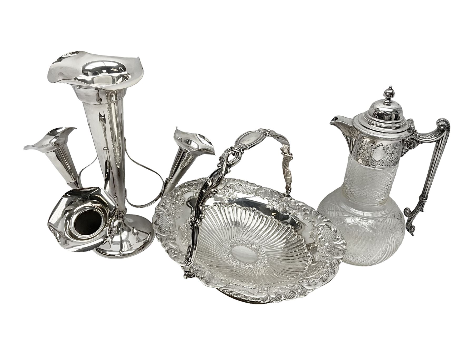 Silver plated three branch epergne, together with a silver plated cut glass claret jug, and silver plated embossed swing handled basket, epergne H30.5cm