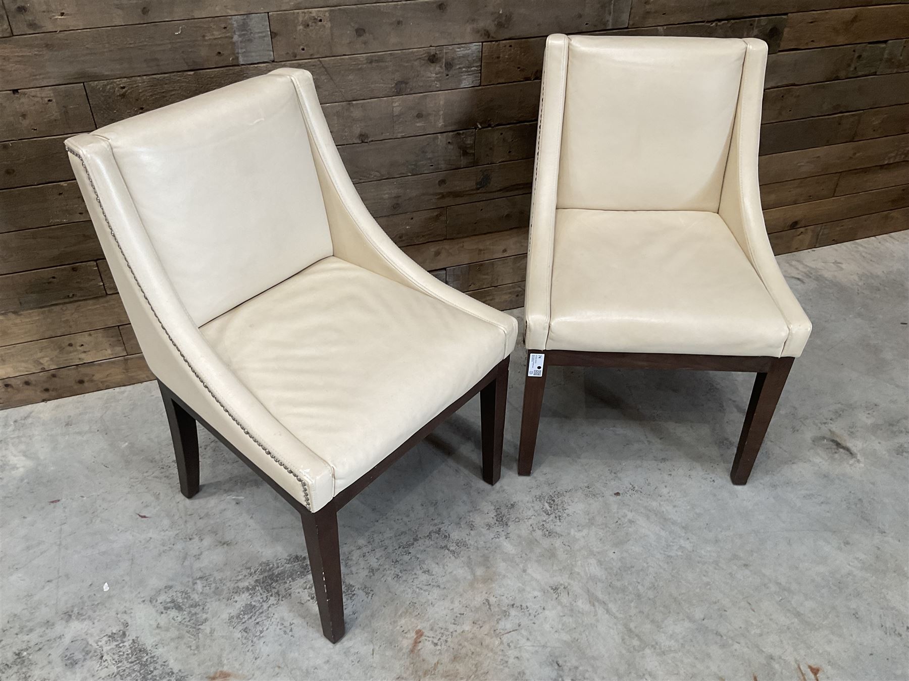 28 x walnut framed dining chairs, upholstered in beige leather