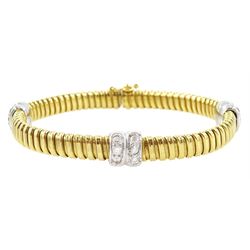 18ct yellow and white gold flexible cubic zirconia bracelet, stamped 750