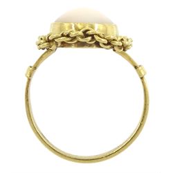 18ct gold single stone coral ring, with chain decoration border, stamped 750