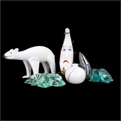 Milk glass decanter, modelled as a moon with a painted face, together with glass animals modelled as a polar bear, turtle and badger, together with other glass  