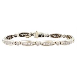 14ct gold diamond link bracelet, single round brilliant cut diamonds spaced by four prince...