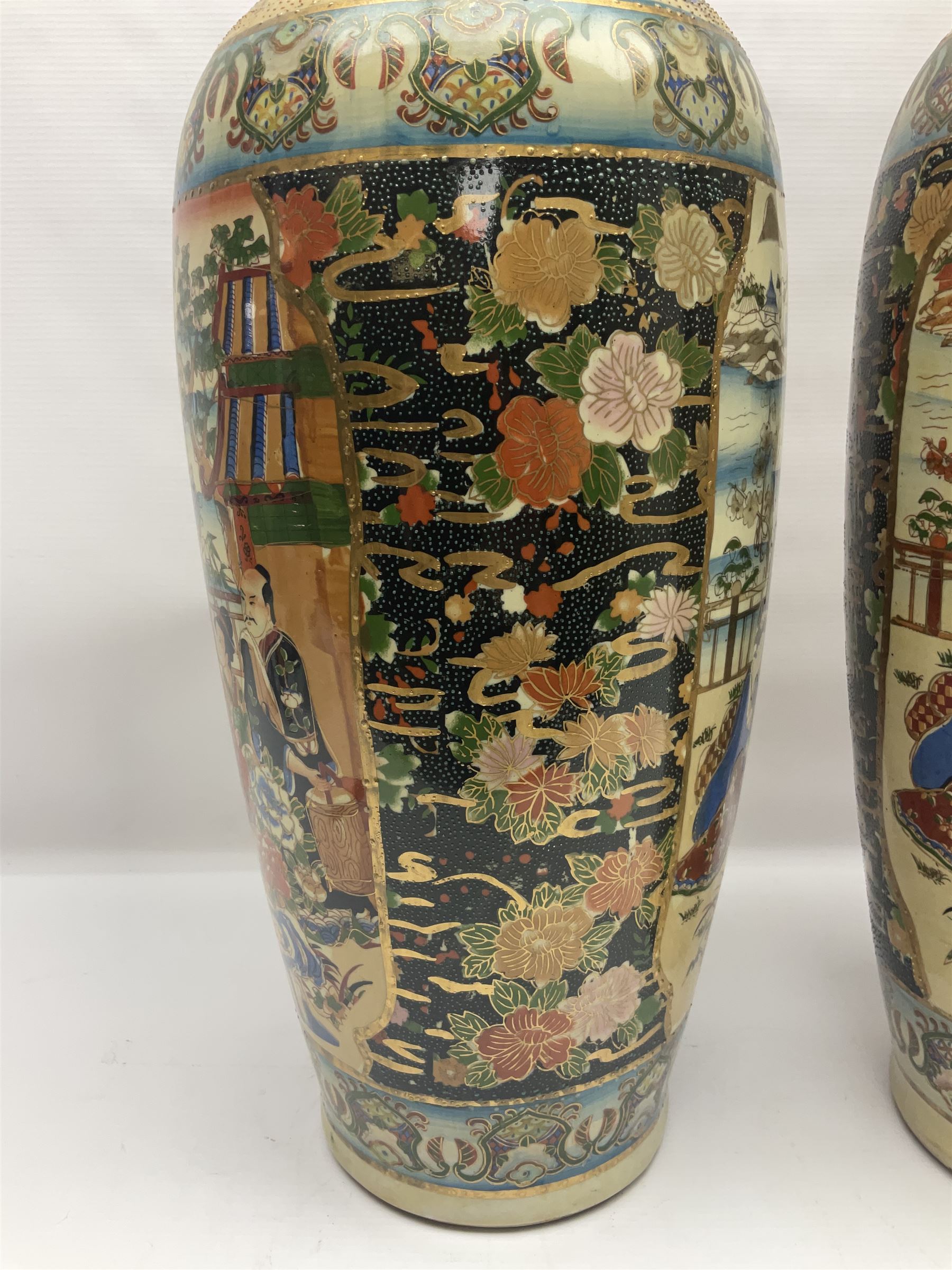 Pair of modern Satsuma vases of baluster form, decorated with figures in within river landscapes and floral borders, highlighted in gilt, H60cm