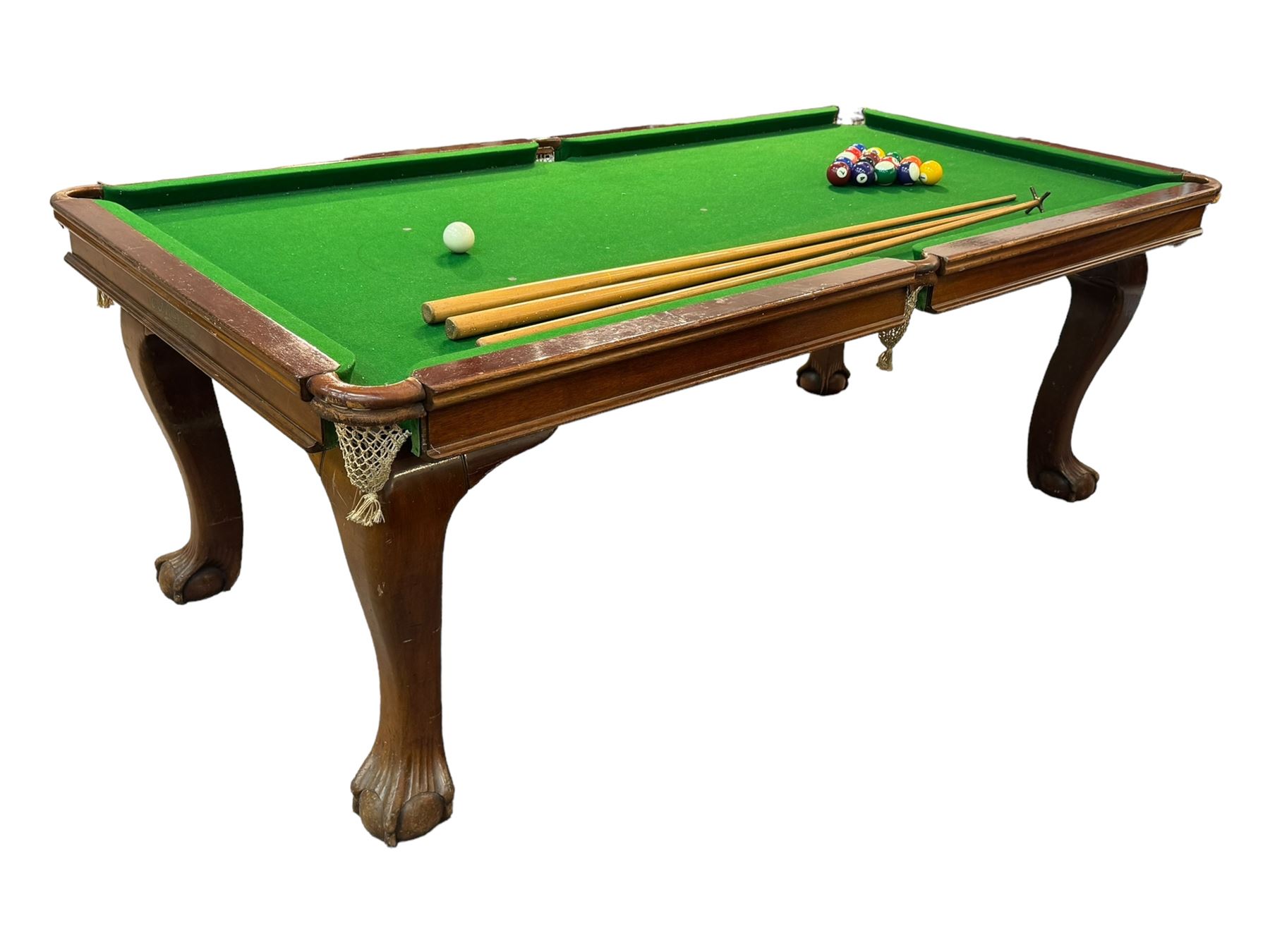 Riley - mahogany slate bed snooker dining table, green baize playing surface fitted with leather net pockets, raised on cabriole supports ending in ball and claw feet; together with set of Riley cues, balls and scoreboard