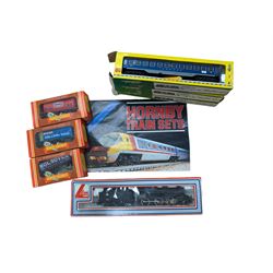 Lima '00' gauge locomotive 205120 MWG no. 42700, three Hornby goods wagons, three  Fleischmann HO gauge Touropa coaches, all boxed and a Hornby Train Sets pull out leaflet